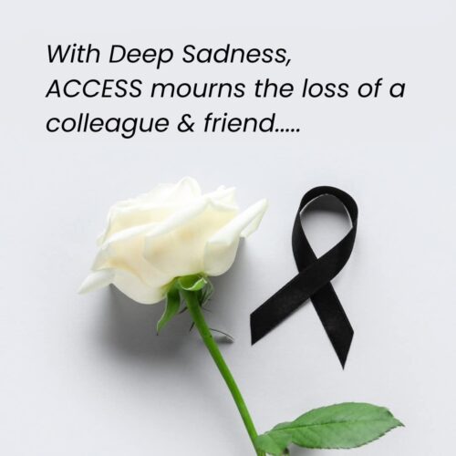 ACCESS Stories May 2026: What Death Teaches About Living Abroad. A white rose and a black ribbon next to each other